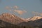 The majestic mountains of the Trans-Ili Alatau during the summer sunset