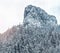 Majestic mountains in winter with white snowy spruces. Wonderful wintry landscape. Amazing view on snowcovered rock mountains.