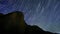 The Majestic Night Sky: A Celestial Display Above a Majestic Mountain Range