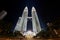 Majestic night view to the Petronas twin towers and surrounding buildings in Kuala Lumpur, Malaysia.