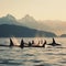 Majestic Orcas Leaping Against Mountain Backdrop