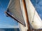 Majestic sailboat gracefully navigating the blue sea, showcasing traditional nautical transportation