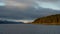 Majestic scene of Patagonian fjords surrounded by towering mountains