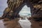 majestic sea cave archway revealed by low tide