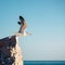 Majestic seagull taking off the cliff