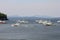 Majestic seascape view with many fishing boats on a seawater