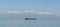 Majestic ship sailing across the azure waters of Thessaloniki, Greece