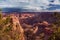 Majestic skies over a dappled sunlight Grand Canyon