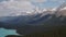 Majestic Snow-Capped Mountain Peaks Over Forest Landscape