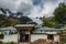 The majestic snow-capped mountains are covered by thick clouds