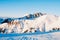 Majestic snow-covered mountain against an ethereal sky