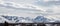 Majestic snowcapped mountains under lenticular clouds in the spring in Denali National Park in Alaska USA