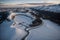 Majestic Snowy Mountains Aerial Serenity at Sunset.AI Generated