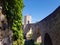 Majestic stone arched bridge in Besalu - famous medieval village Catalonia, Spain. Amazing atmospheric place for tourism near Me