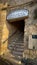 Majestic stone entrance featuring a wall and a sign situated in the front: Old Jaffa