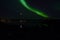 Majestic strong aurora borealis on autumn star filled night