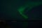 Majestic strong aurora borealis on autumn star filled night