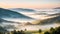 Majestic sunrise in the mountains landscape. Panoramic view of foggy valley