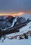 Majestic sunset in the winter mountains landscape. Dramatic sky