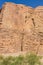 Majestic vertical red cliffs in the Wadi Rum Desert. Beautiful mountain landscapes of nature Jordan