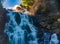 Majestic view of Balea Cascada waterfall in Fagaras mountains, Romania