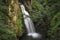 Majestic view of the waterfall Wilczki. Miedzygorze. Sudety Mountains. Poland.