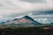 majestic volcanic mountains and cloudy