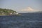 Majestic Volcano Mount Rainier seen from West Point Lighthouse, near Seattle, USA