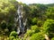 Majestic water cascade of Powerscourt Waterfall, the highest waterfall in Ireland.