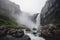 majestic waterfall crashing over rugged rock formation, with mist rising from the cascade