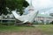 Majestic whale sculpture stands in a public park