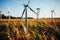 Majestic wind turbines in vibrant green meadow harness sustainable energy in picturesque landscape