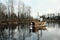 Majestic wooden sailboat is securely docked on a lake,