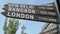 Major city distance signage include new york, bangkok and london city