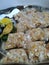 Makara Sankranti or Pongal Distribution Raw Sweet Packets arranged in a Steel Plate