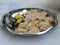 Makara Sankranti or Pongal Distribution Raw Sweet Packets arranged in a Steel Plate