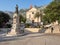 Makarska, Dalmatia, Croatia - July 20, 2021: Cathedral of St. Mark and statue of Andrija Kacic Miosic in the old town.