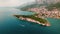 Makarska Riviera's Picturesque Coastline with Serene Sea and Verdant Peaks. Aerial view of peaceful town and nature