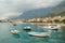 Makarska town harbor with small boats