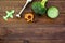 Make baby food at home. Puree with broccoli near immersion blender and toy on dark wooden background top view copy space