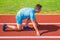 Make effort for victory. Runner ready to go. Adult runner prepare race at stadium. How to start running. Sport tips from