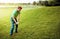 Make every shot count. a young man spending the day on a golf course.