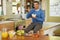 Make the healthy choice every morning. Portrait of a happy young man enjoying a bowl of muesli at home.