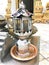 Make merit Fuel oil candle.Shining flame in the oil waiting in temple Thailand.