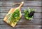 Make seasoning and condiments. Herbs in mortar on dark wooden background top-down