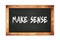 MAKE  SENSE text written on wooden frame school blackboard