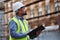 Always make sure of the rules. Shot of a contractor filling out paperwork at a construction site.