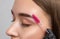 The make-up artist does Long-lasting styling of the eyebrows of the eyebrows and will color the eyebrows. Eyebrow lamination.