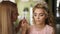 Make-up artist paints the face of the bride, in a beautiful salon. Professional makeup for woman with healthy young face