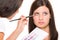 Make-up artist woman fashion model apply eyeshadow